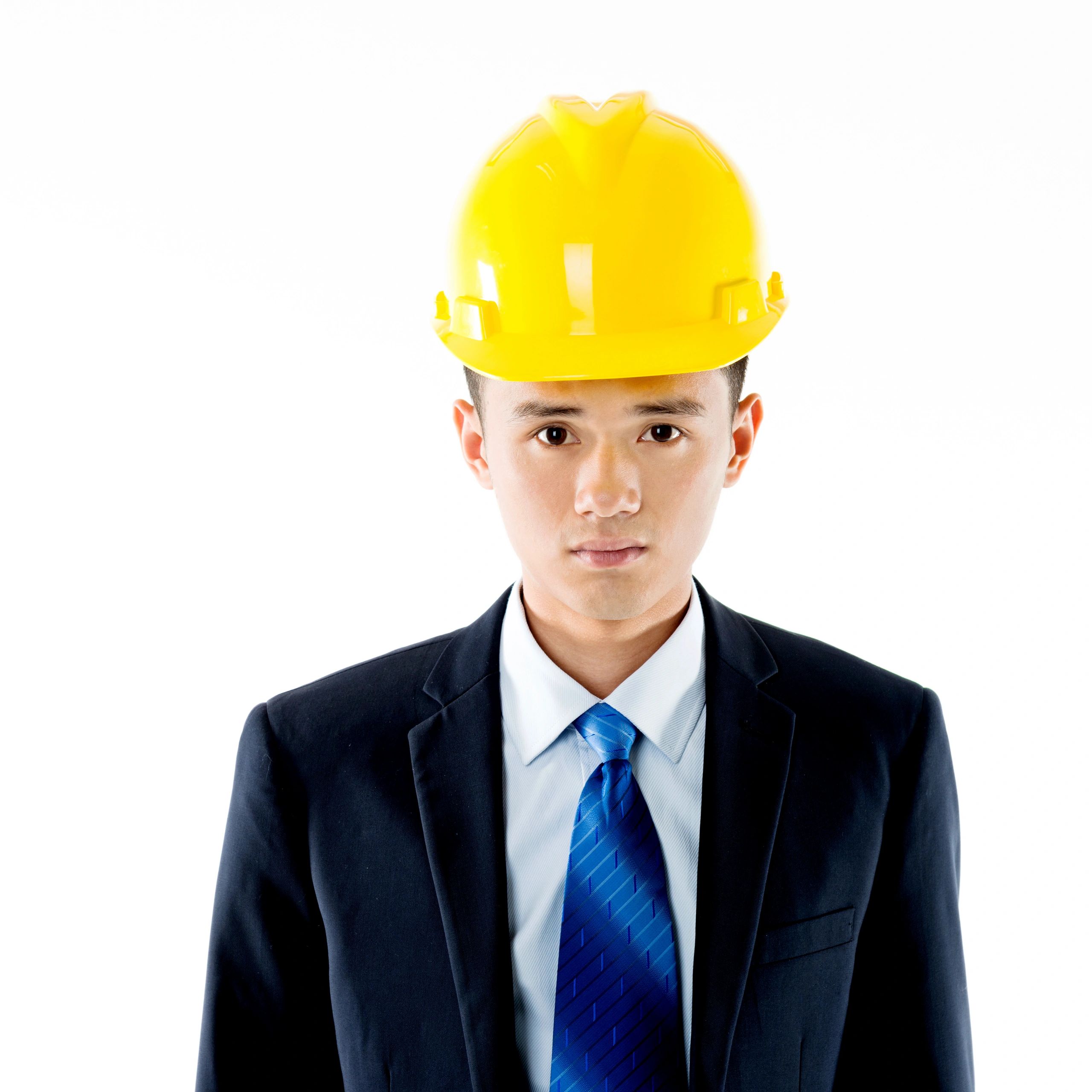Portrait of an engineer wearing a safety helmet